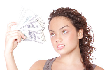 Image showing Attractive woman takes lot of 100 dollar bills