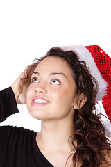 Image showing young woman wearing christmas hat