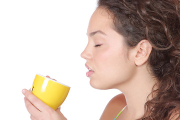 Image showing Young woman with a cup