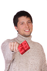 Image showing young man with a gift box