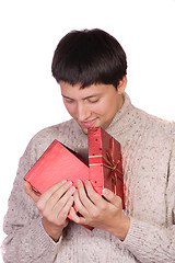 Image showing young man with a gift box