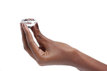 Image showing Female hand holding diamond