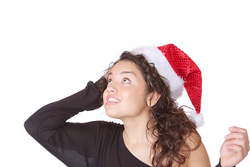 Image showing young woman wearing christmas hat