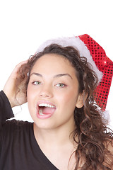 Image showing young woman wearing christmas hat