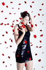 Image showing Rose petals woman