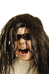 Image showing Screaming boy in wig