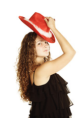 Image showing Curly woman in red hat