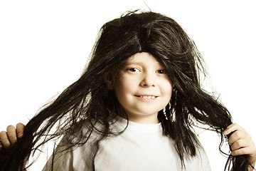 Image showing Smiling boy in wig
