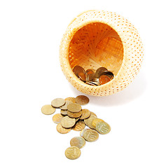 Image showing Coins poured out of basket
