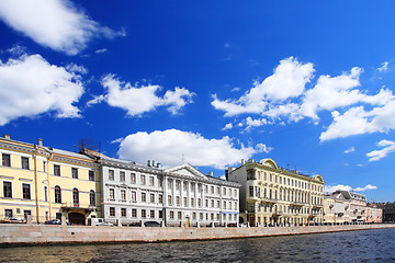 Image showing Old buildings alongside channel