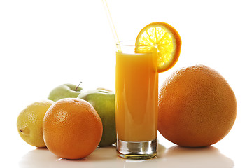 Image showing Fresh juice and fruits in counterlight