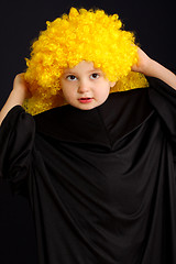 Image showing Cute boy in yellow wig