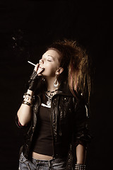 Image showing Smoking girl in black