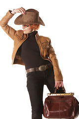 Image showing Redhead traveller with brown bag