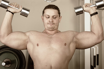 Image showing Guy with dumbbells