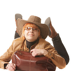 Image showing Redhead traveler laying down on bag