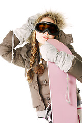 Image showing Woman posing with snowboard