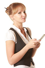 Image showing Smiling woman holding mobile