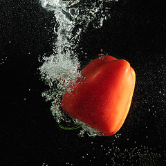 Image showing Red paprika in dark water