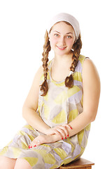 Image showing Smiling woman on small bench