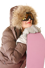 Image showing Young woman in hood with snowboard