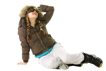 Image showing Snowboarder woman looking up