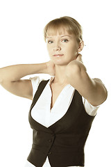 Image showing Blonde businesswoman hands behind neck