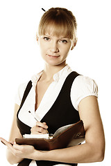 Image showing Blonde businesswoman with open notepad