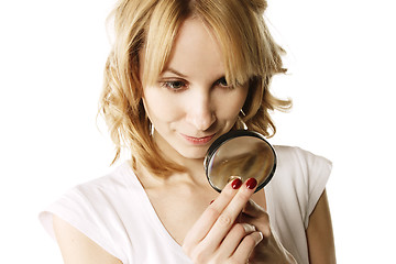 Image showing Blonde examining ring