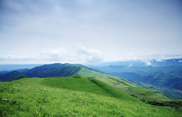 Image showing Low clouds over mountains