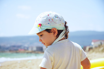 Image showing Girl on beach sideview