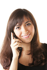 Image showing Smiling brunette woman with phone