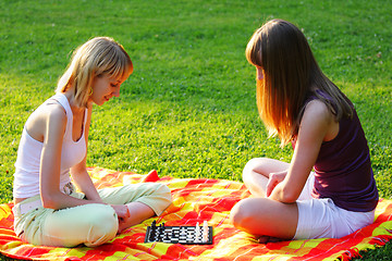 Image showing Blond friends playing chess
