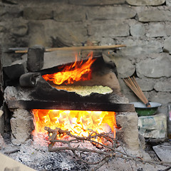 Image showing Bread on open flame