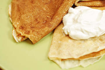 Image showing Pancakes with sour cream