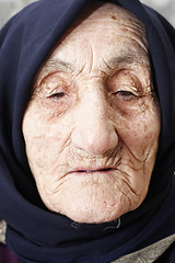 Image showing Old woman lost in thoughts