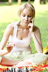 Image showing Woman playing chess