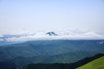 Image showing Clouds surrounds mountain peak