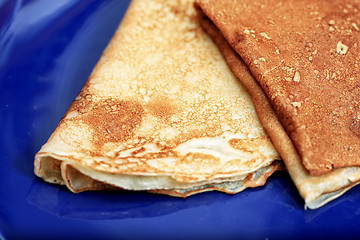 Image showing Pancakes on blue plate