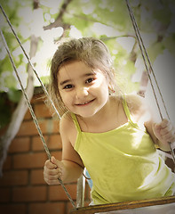 Image showing Girl on swings