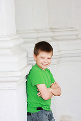 Image showing Smiling boy hands folded