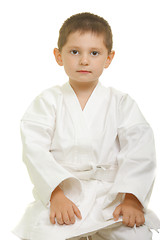 Image showing Karate boy sitting on knees