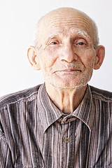 Image showing Senior man looks to camera