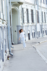 Image showing Jumping girl on street