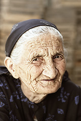 Image showing Cunning gaze of senior woman