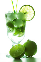 Image showing Mojito and limes in counter light