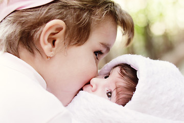 Image showing Sisters outdoors