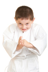 Image showing Funny karate kid makes a bow 