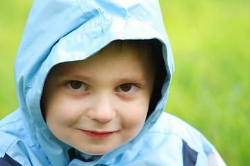Image showing Boy in blue hood