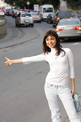 Image showing Hitchhiking brunette